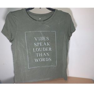 American Eagle Outfitters olive shirt.